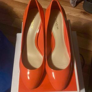 Orange coach pumps